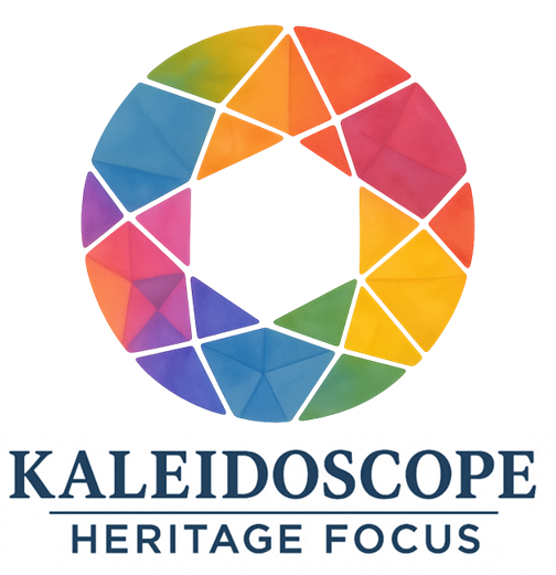 A circular geometric design composed of multicolored triangular and quadrilateral shapes arranged in a ring pattern. The shapes resemble fragments of a kaleidoscope, with vivid colors including red, orange, yellow, green, blue, and purple. The center of the circle is white and hollow, creating a camera aperture–like effect. Each colored shape has a watercolor texture and is surrounded by a soft, glowing aura that blends into the white background. Under logo in all-caps is, Kaleidoscope, with a line underscoring. Bottom text says in all caps, Heritage Focus.